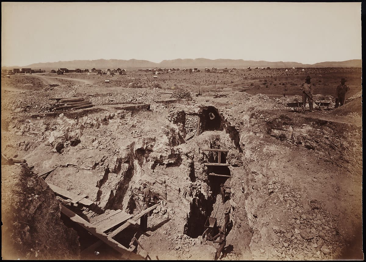 The "Old South Shaft Ore Quarry, Face of Tough-nut Mine, part of Town of Tombstone, Arizona. Dragoon Mountains, with Cochise Stronghold in background" - Carleton E. Watkins, 1880
