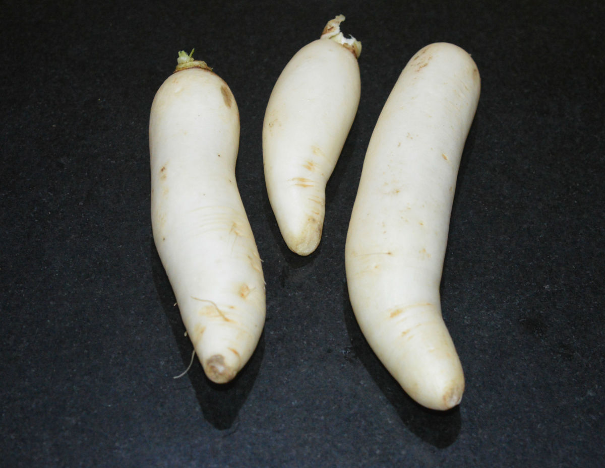 Step one: Wash radish and peel them. Grate them. Set aside.