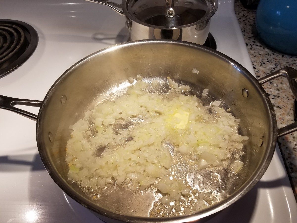 Cook the onion in the pan with olive oil, garlic and butter until translucent.