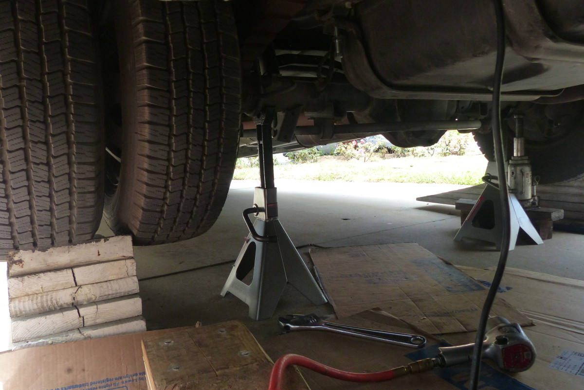 Always support the vehicle on jack stands when working underneath.