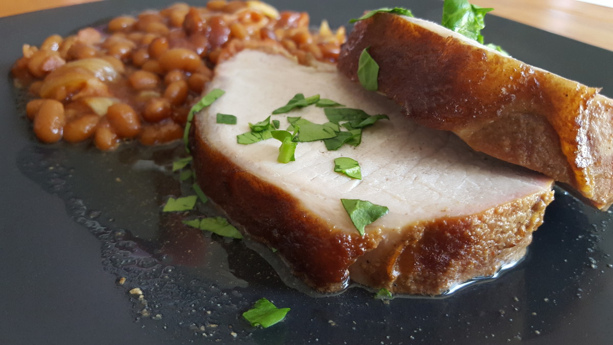 Juicy, smoked wild hog tenderloin is so tender, you can cut it with a fork.