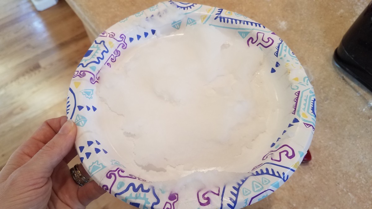 Start by smearing your coconut oil evenly out on a plate and popping it into the freezer. You want it to be super cold for this recipe.