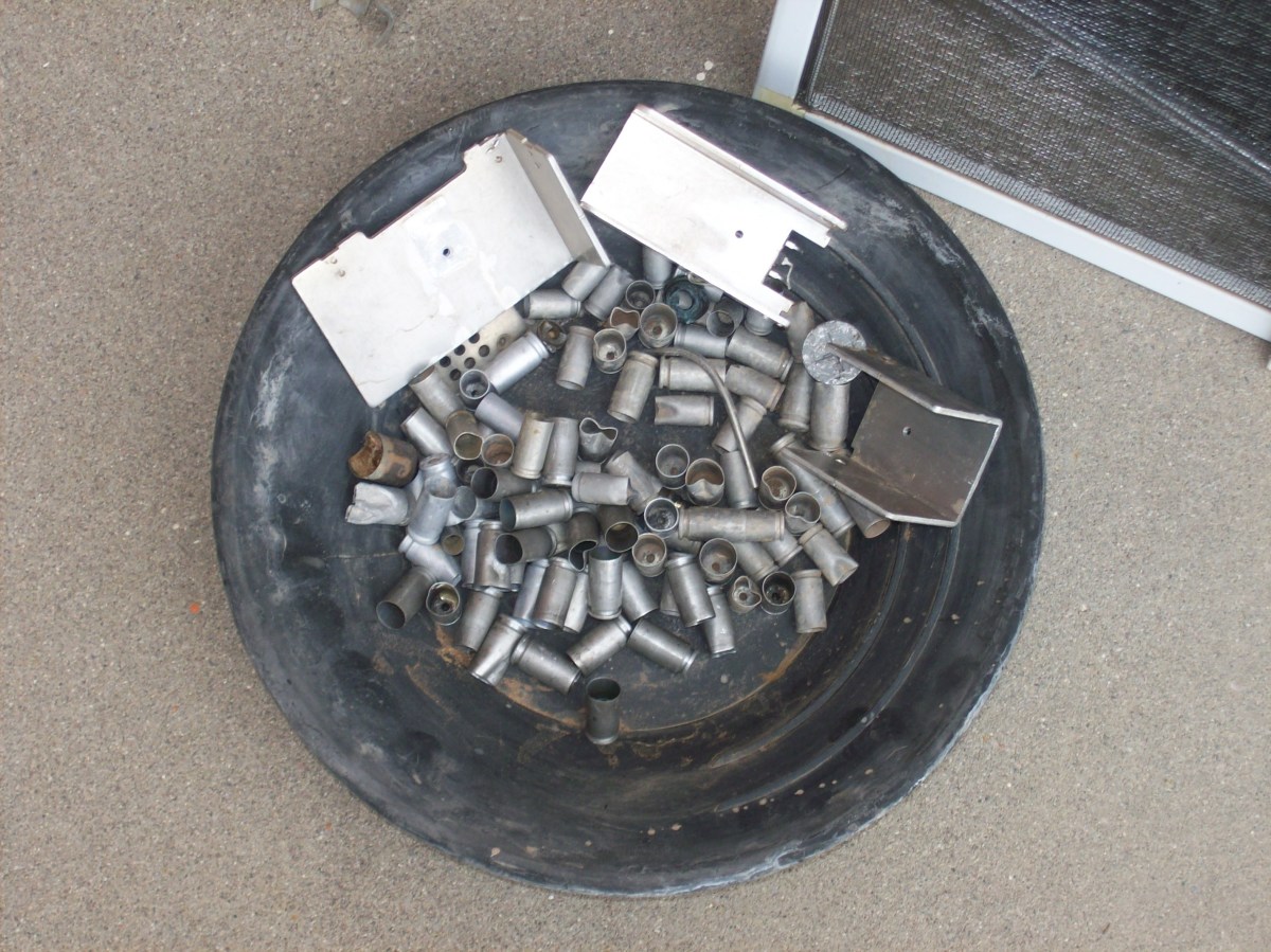 Aluminum wire, aluminum shell casings, aluminum heat sinks, and an aluminum bracket. These are all examples of recyclable objects containing aluminum!