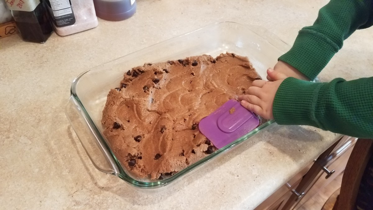 Press your cookie dough down into the bottom of your pan.