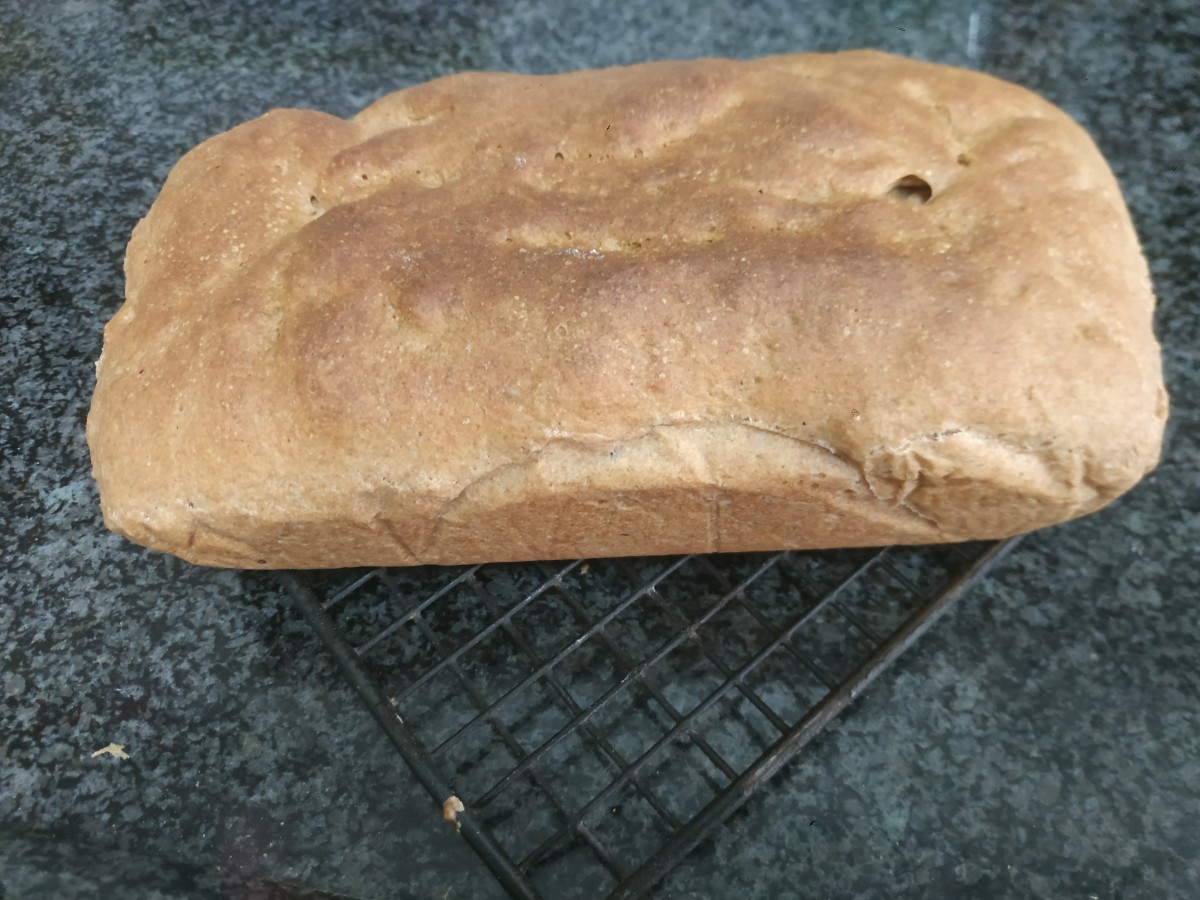 A loaf of spelt bread, fresh from the oven.