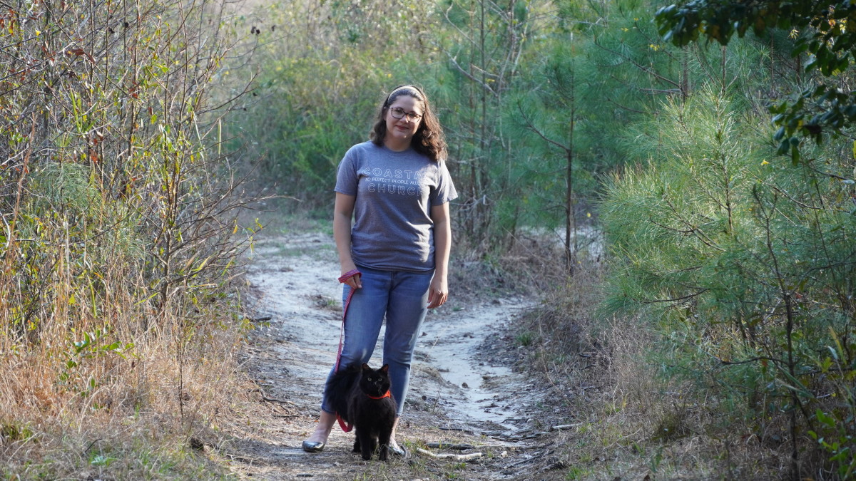 Here I am walking my indoor cat, Layla, in the woods. I started training her when she was almost 9-years-old.