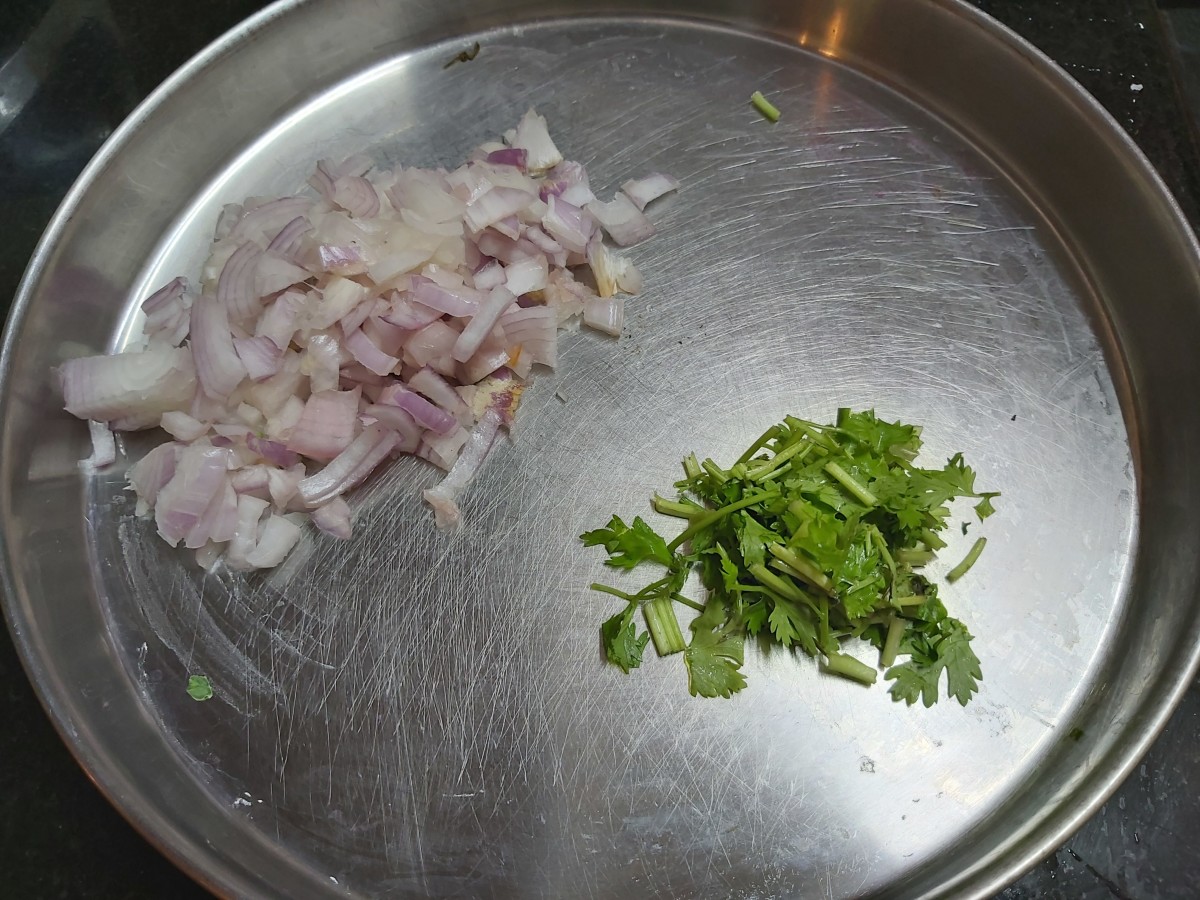 Chop onions and fresh coriander leaves. Set aside.