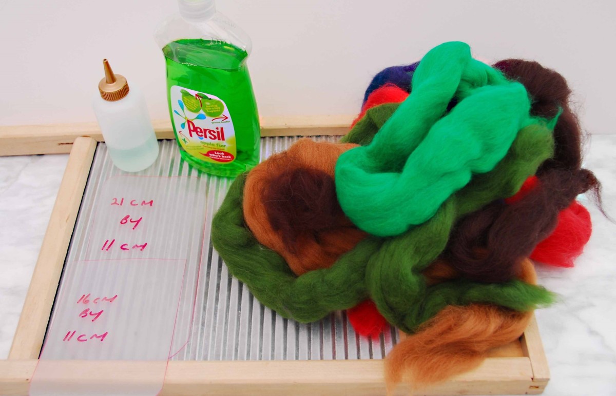 Merino Wool Roving, Dish Washing Liquid, a Squeeze Bottle and a Wash Board