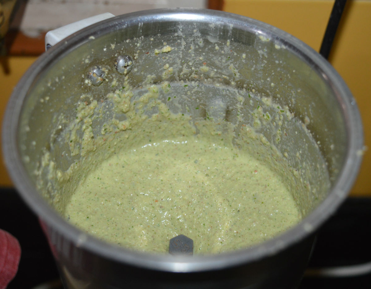 Add mint leaves, coriander leaves, and water as needed. Continue to grind to get a near-smooth paste. Collect the paste in a mixing bowl. This chutney should be semi-solid. Add water to get the right consistency. Mix well.