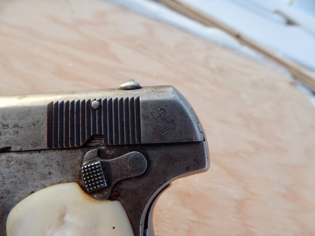 View of the thumb safety. This gun also has a grip safety, pinned on the Bottom, opposite of how a 1911 grip safety works. The thumb safety also doubles as a manual slide lock.