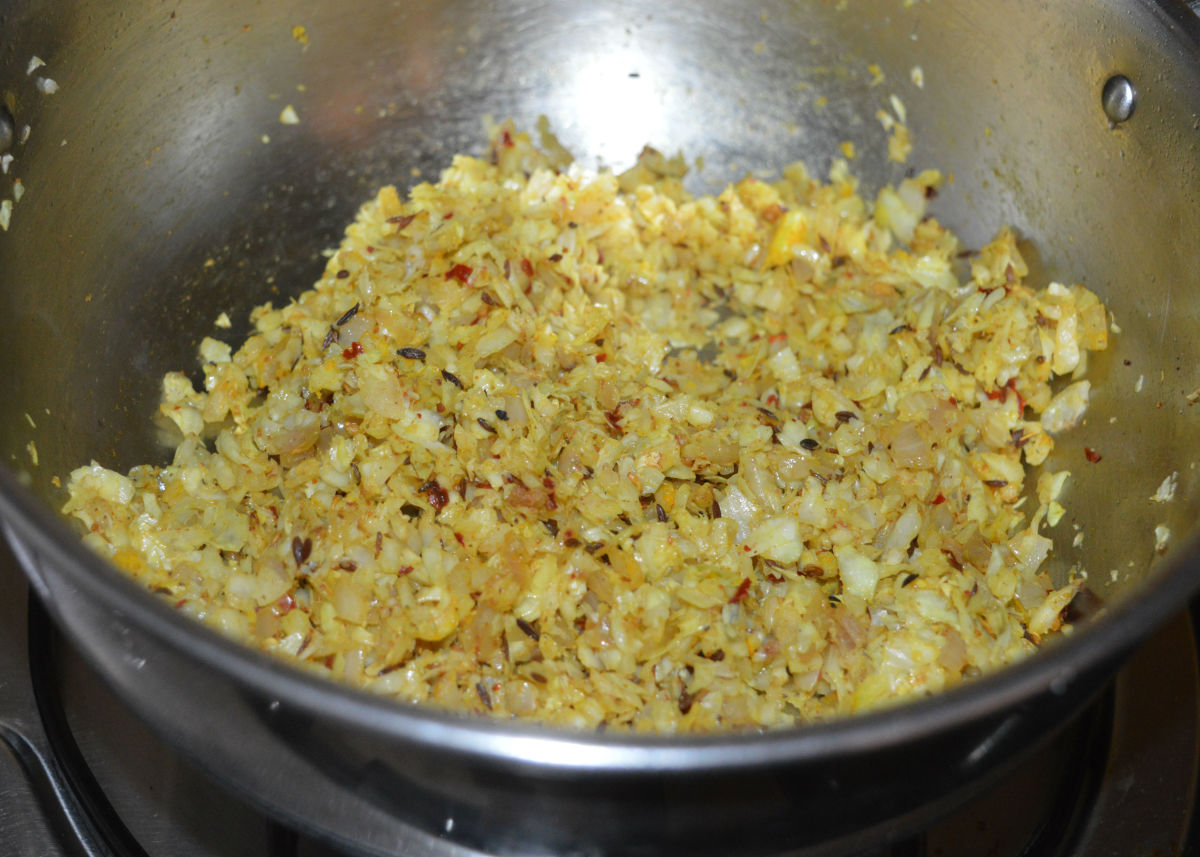 Mix well. Continue to saute the mixture until the spices blend well with the cabbage mixture. Turn off the heat.