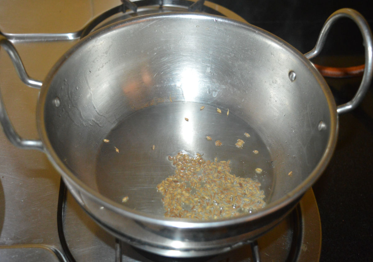 Step one: Heat oil in a deep-bottomed pan. Add cumin seeds and allow them to crackle. 