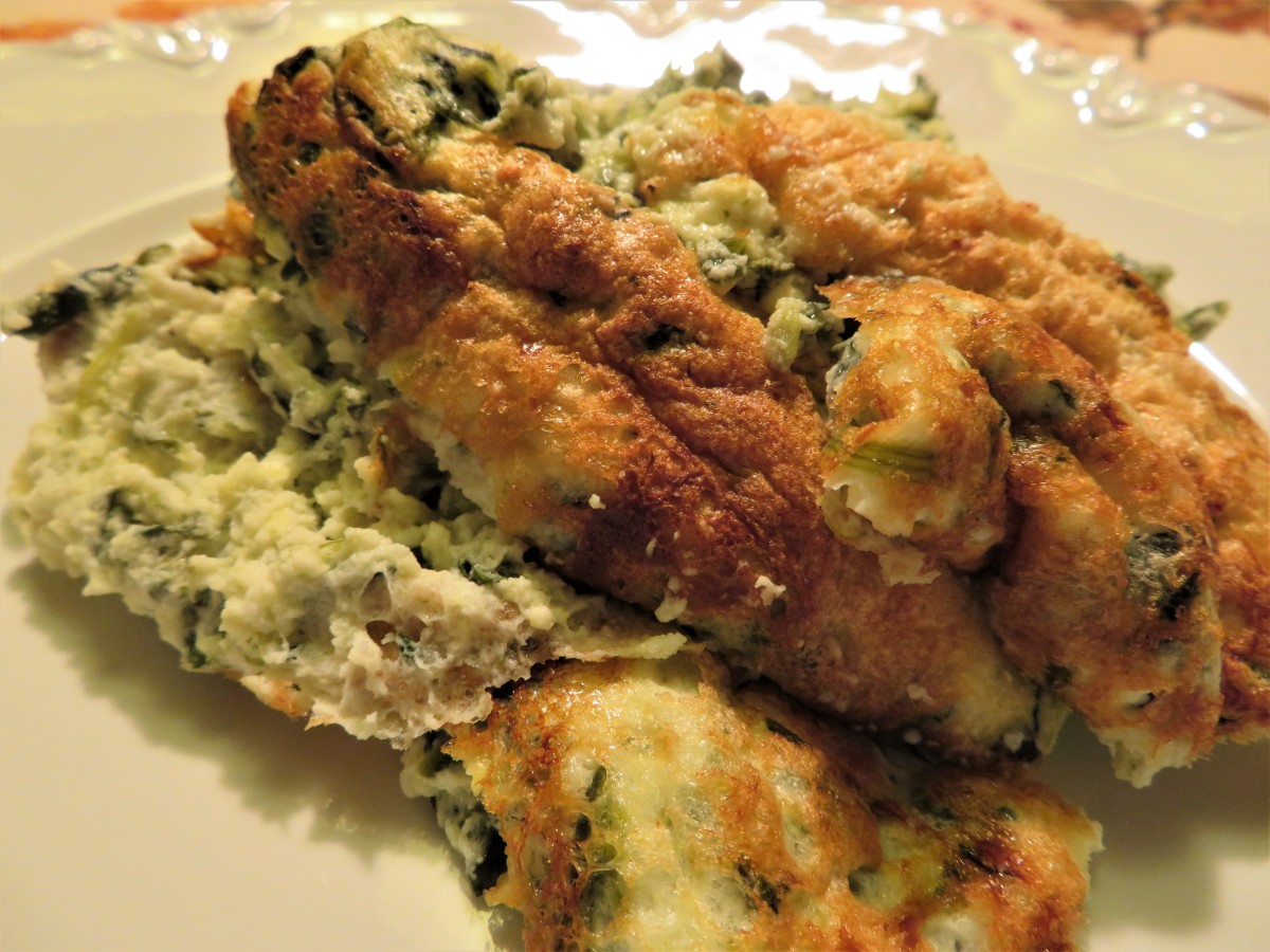 A serving of spinach and goat cheese soufflé