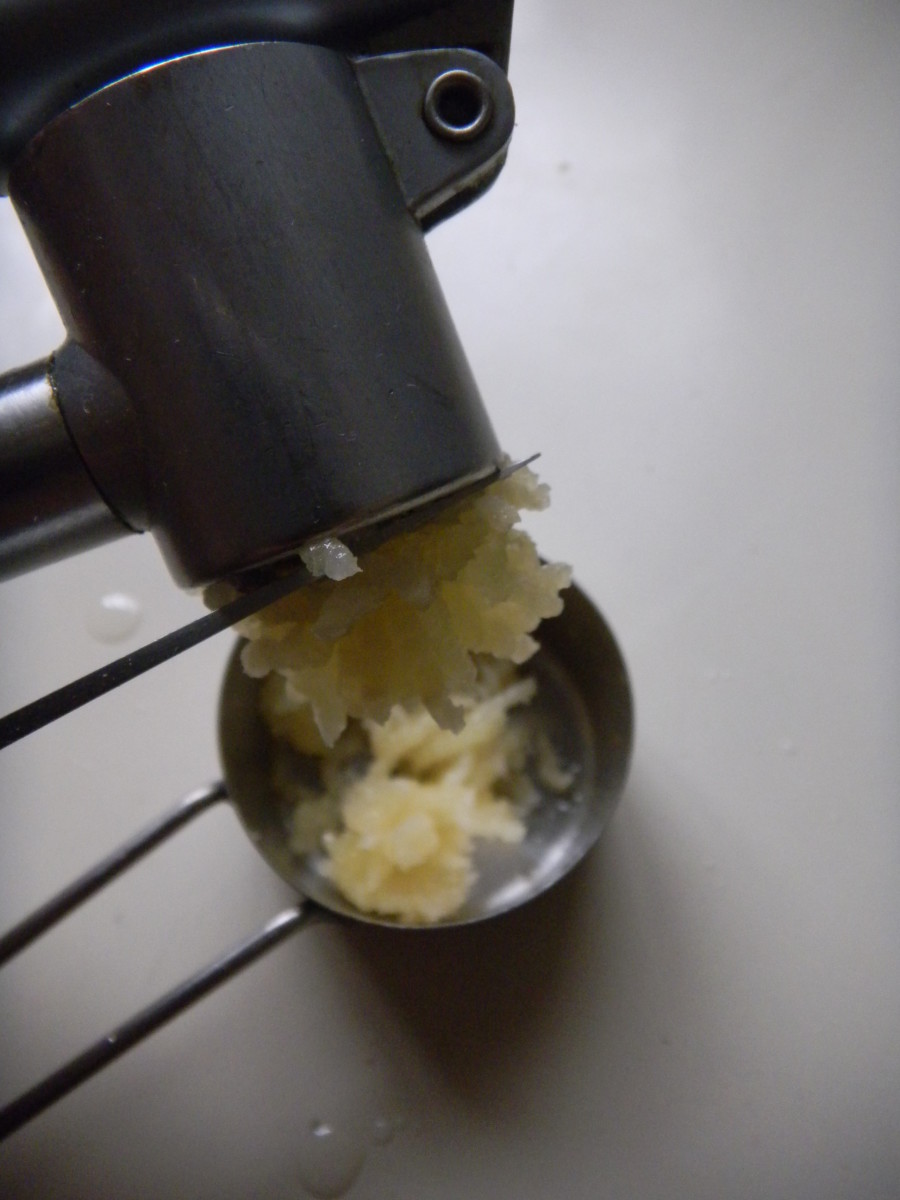 Crush the garlic and leave to one side until ready to fry.