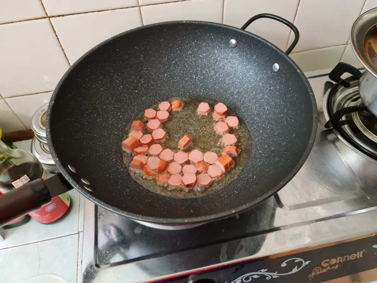 Fry the sausages.