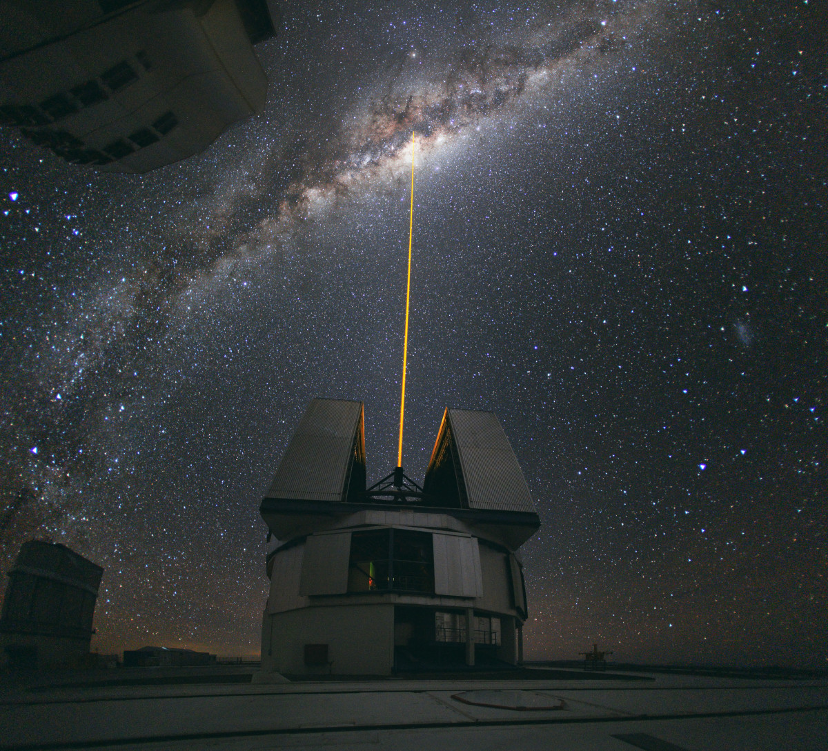 The European Southern Observatory in Chile pointing a laser towards the center of the Milkyway