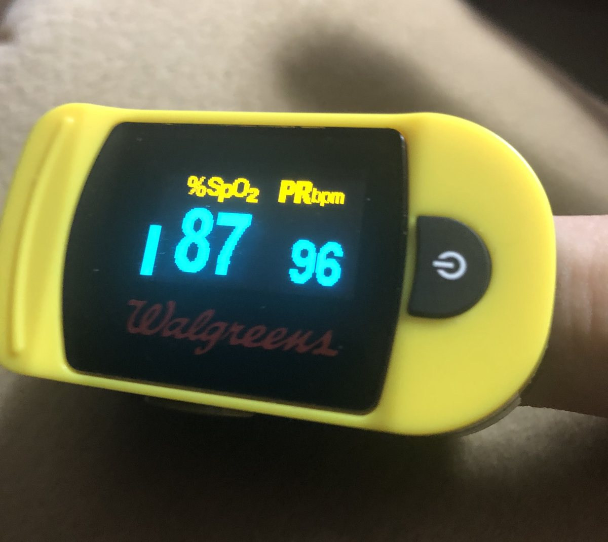 My oxygen level was 87%, seen here on a pulse oximeter, so I went to the ER.