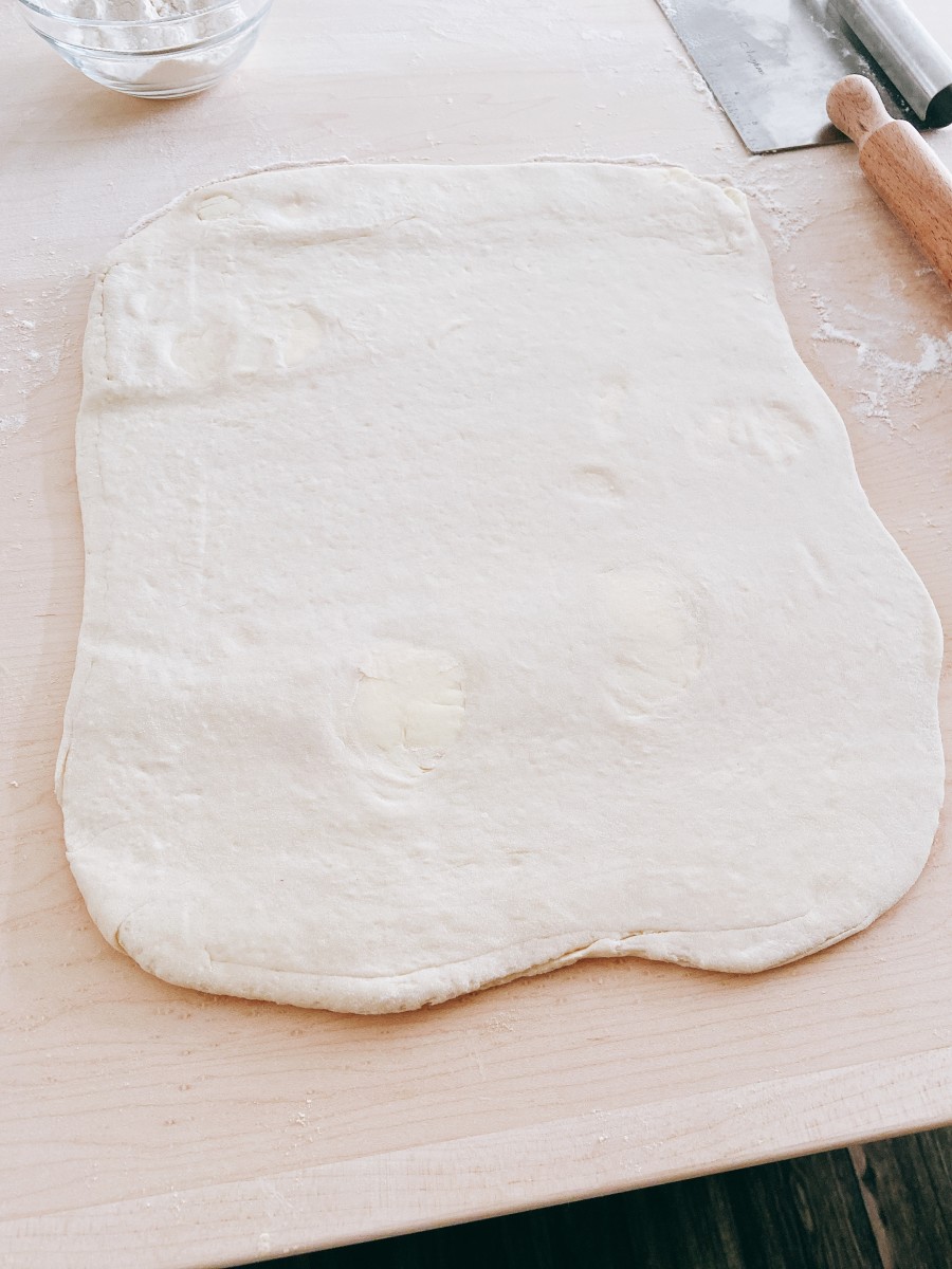 On a lightly floured surface, roll out the Danish dough into a 12-inch (30 cm) square.
