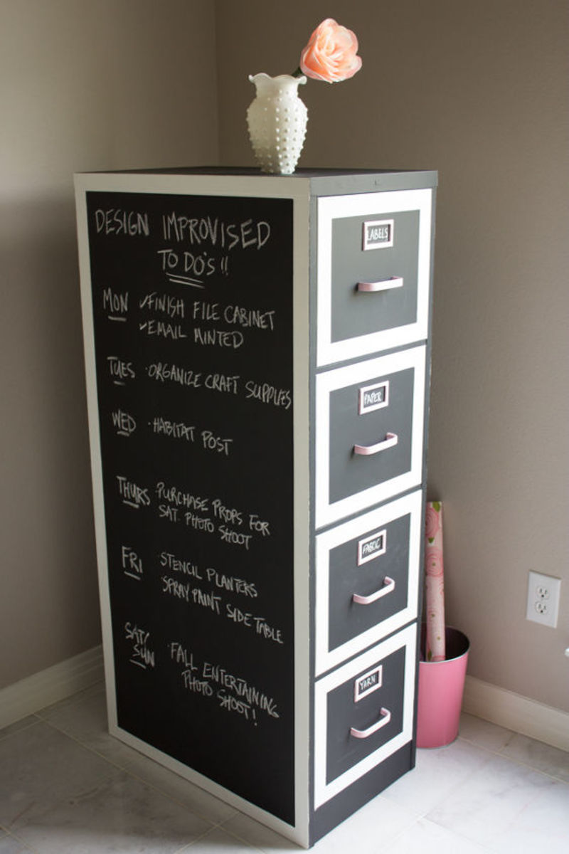 Use some chalkboard paint and create a custom chalkboard file cabinet. You can often find these at your local thrift store
