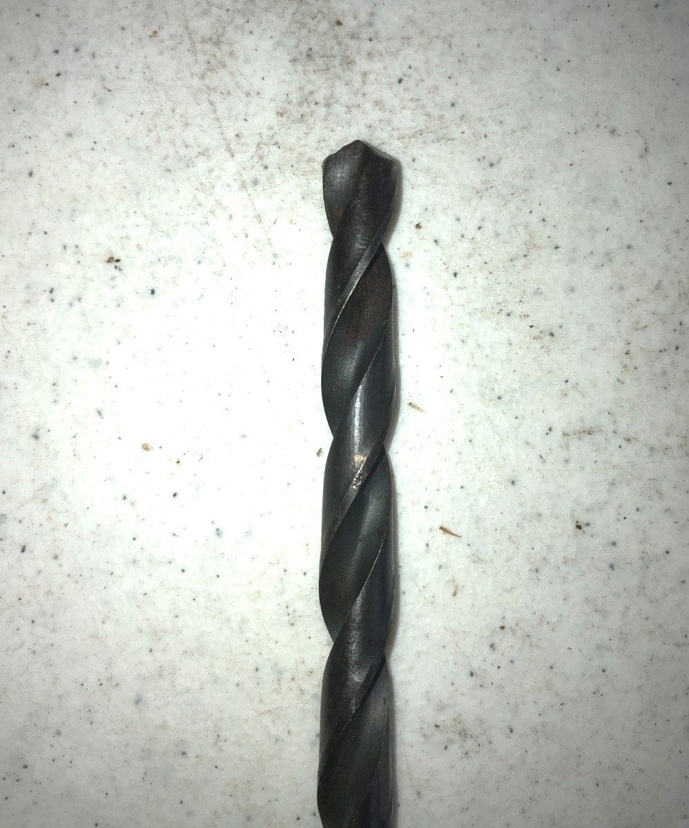 The most common type of drill bit for home use, the twist bit works on both metal and wood.