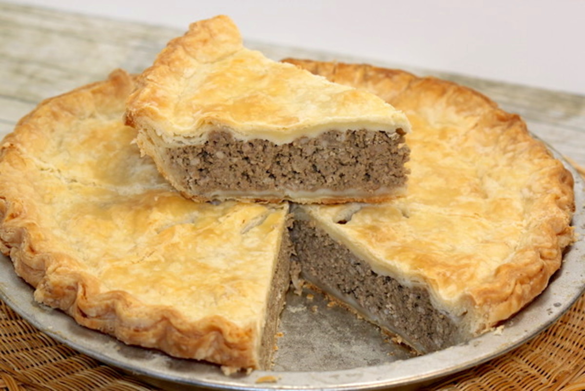 Tourtière is a very rich pie made of flaky crust and savory ground meats.