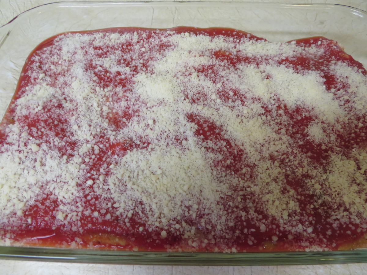 The rest of the tomato sauce and Parmesan cheese over the chicken before baking it for 30 minutes
