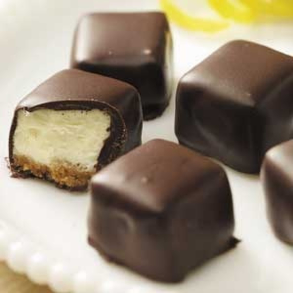 Chocolate covered cheesecake squares.