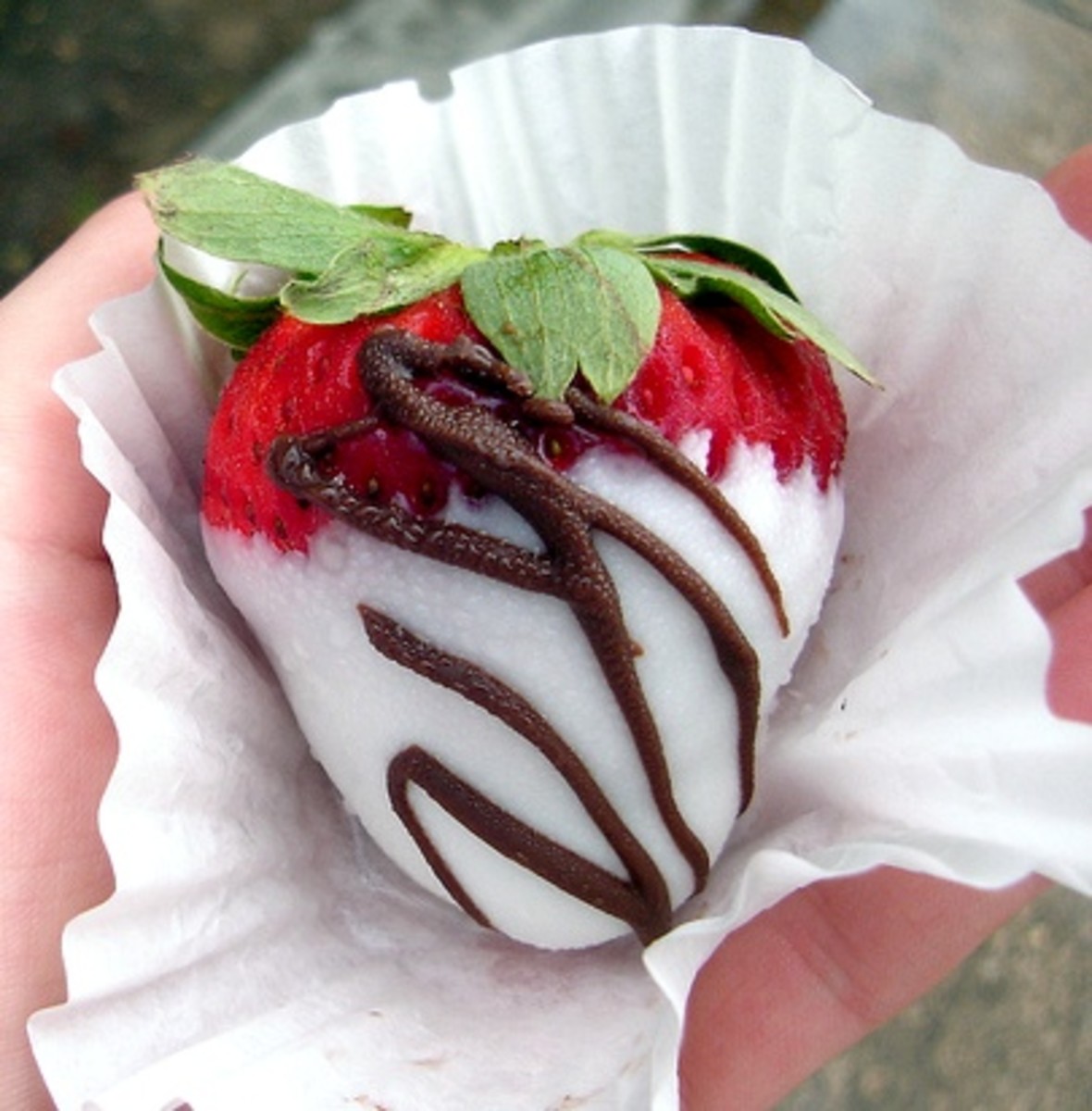 Strawberry dipped in white chocolate and drizzled with milk chocolate.