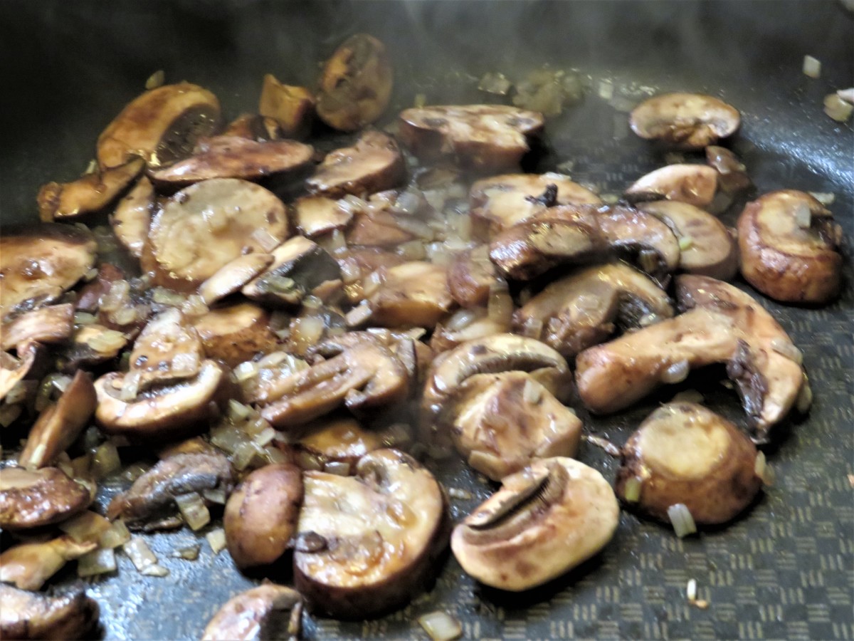 Saute the mushrooms until cooked.
