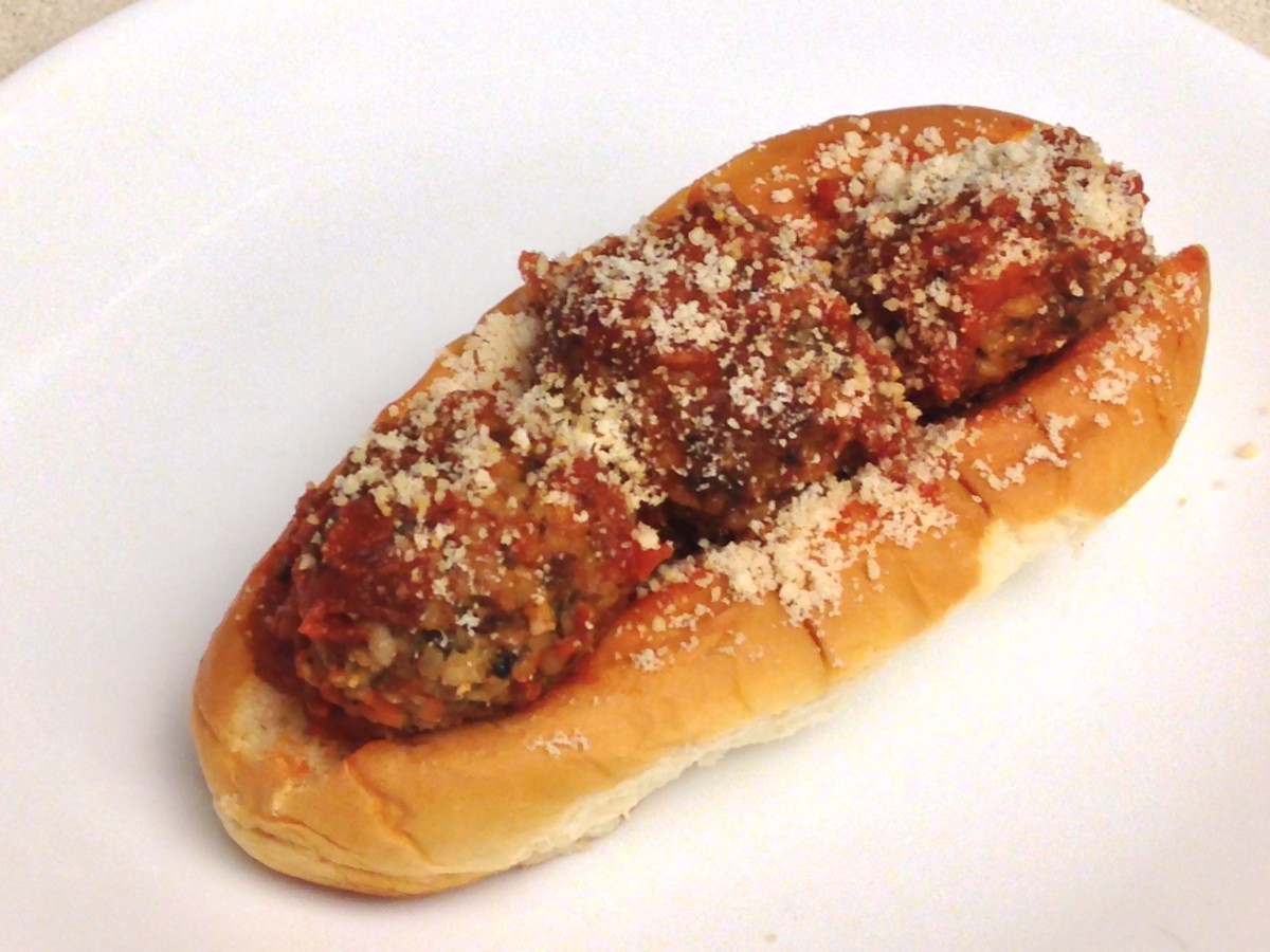 Meatball Hero made with mushroom, oat, and Parmesan meatballs, with spaghetti sauce and cheese