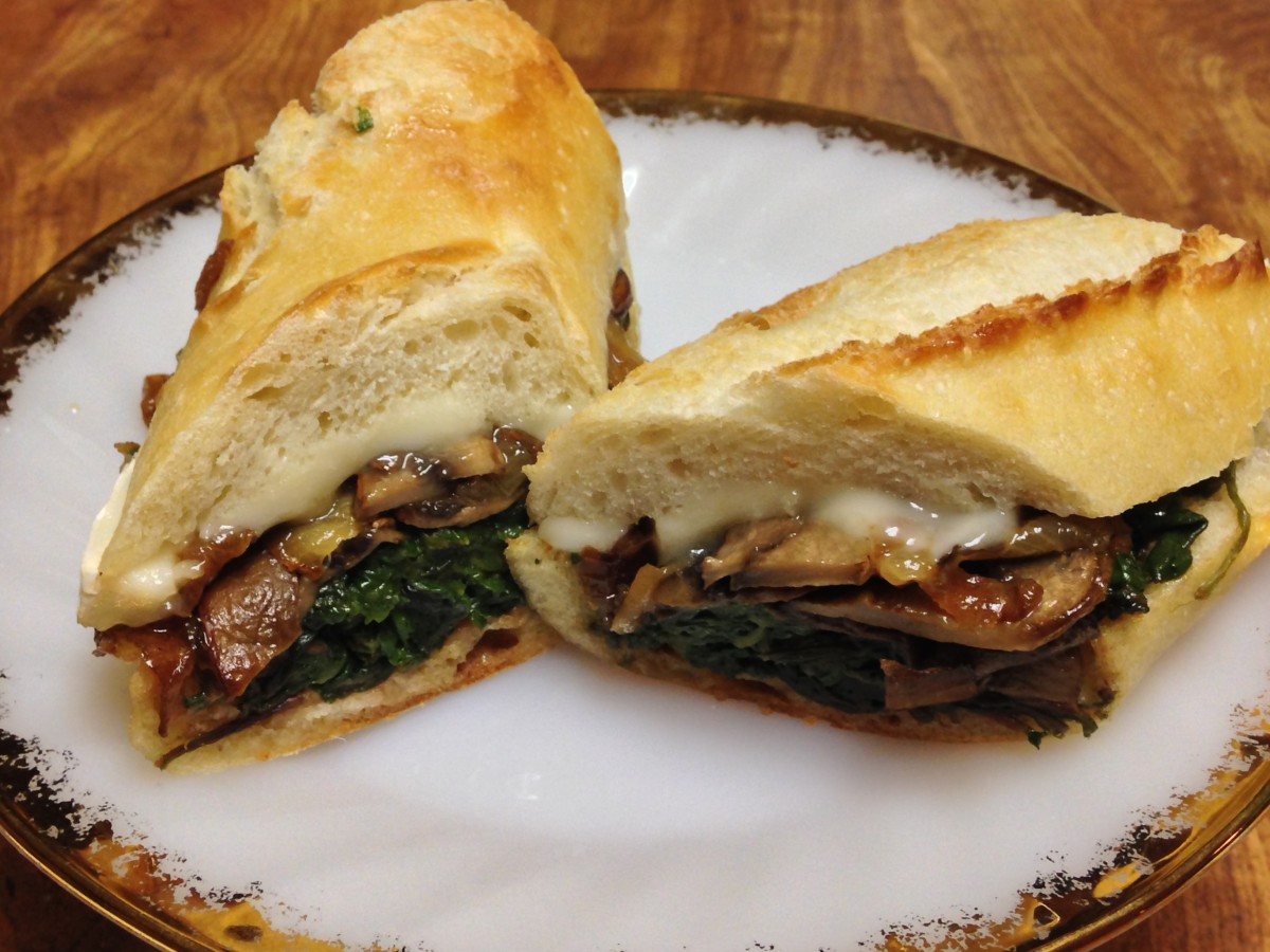 Sauteed baby greens, mushrooms, caramelized onions, and brie on a baguette.   
