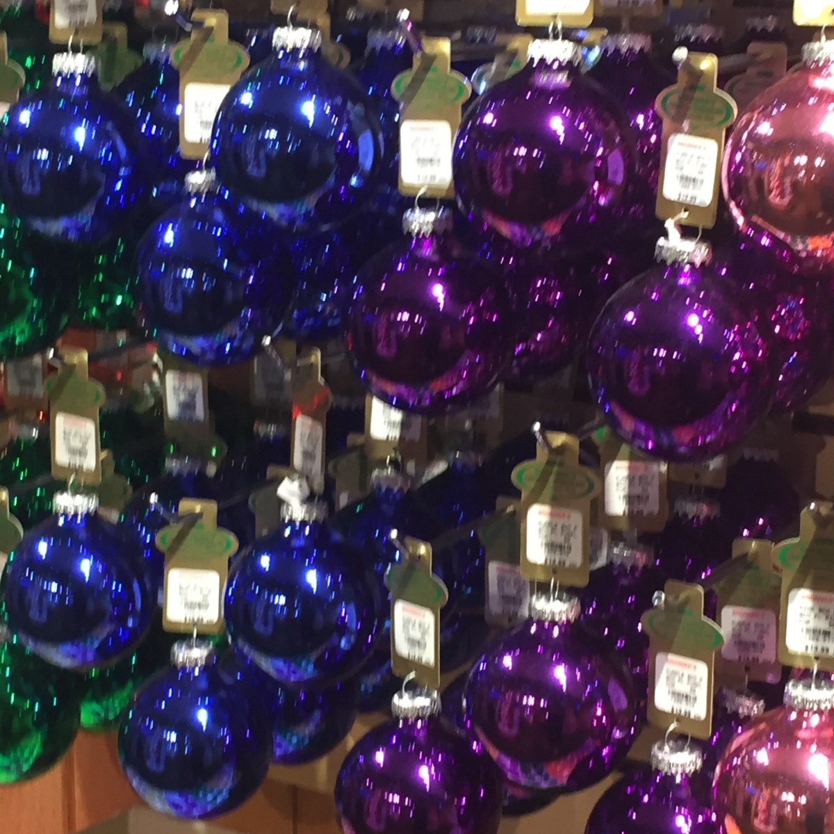 Something about Christmas tree ornaments. Particularly the traditional ball decorations. Especially when they have a glass or mirrored look to them.