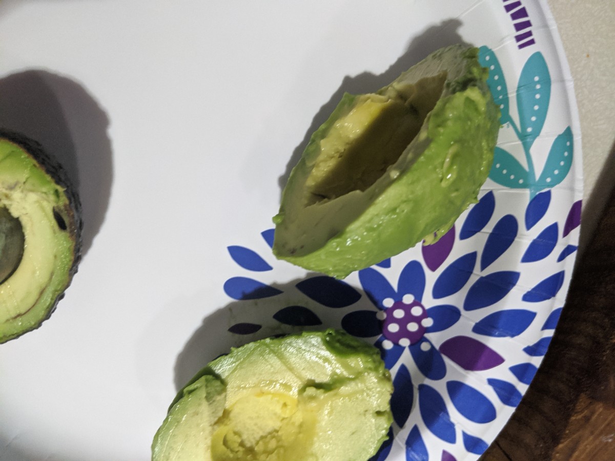 Place avocado on a plate for slicing into stripd