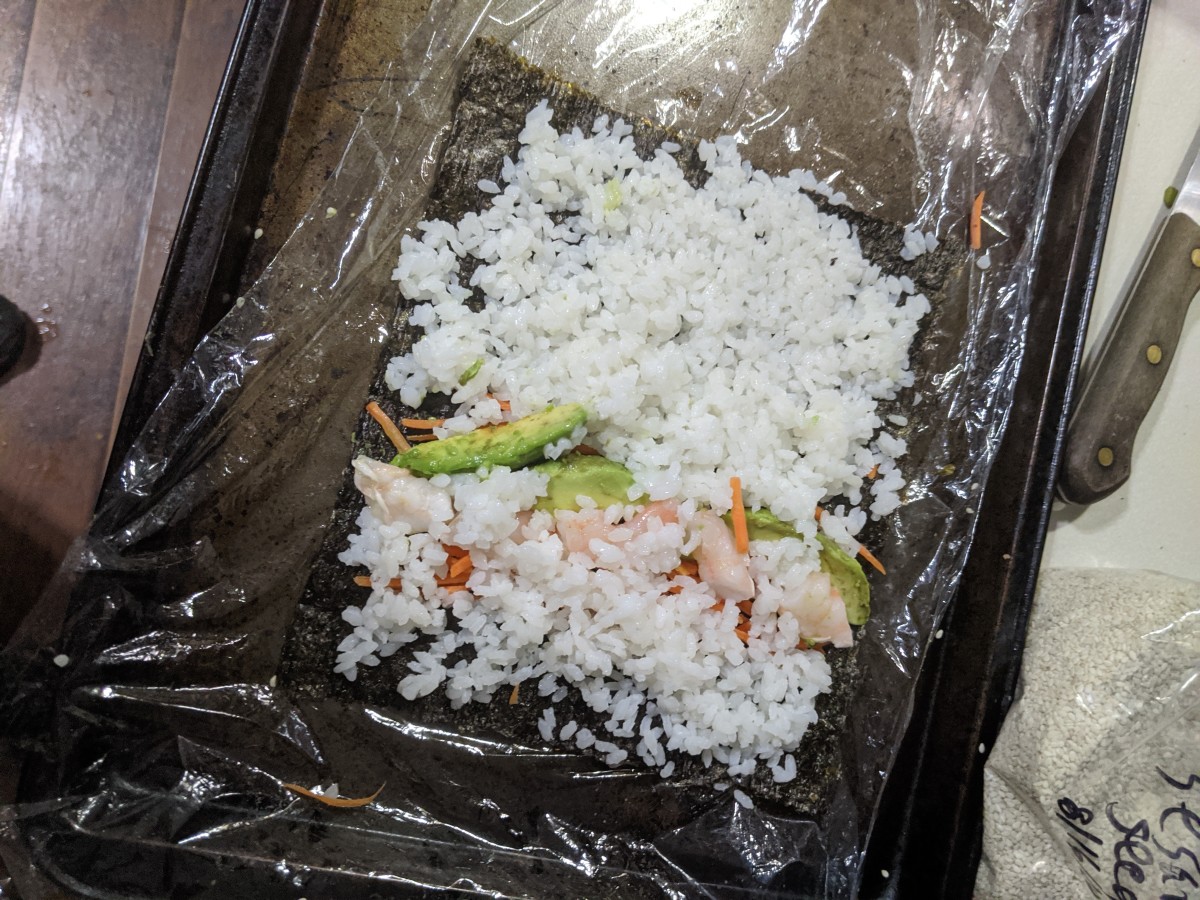 Cover all with thin layer of rice