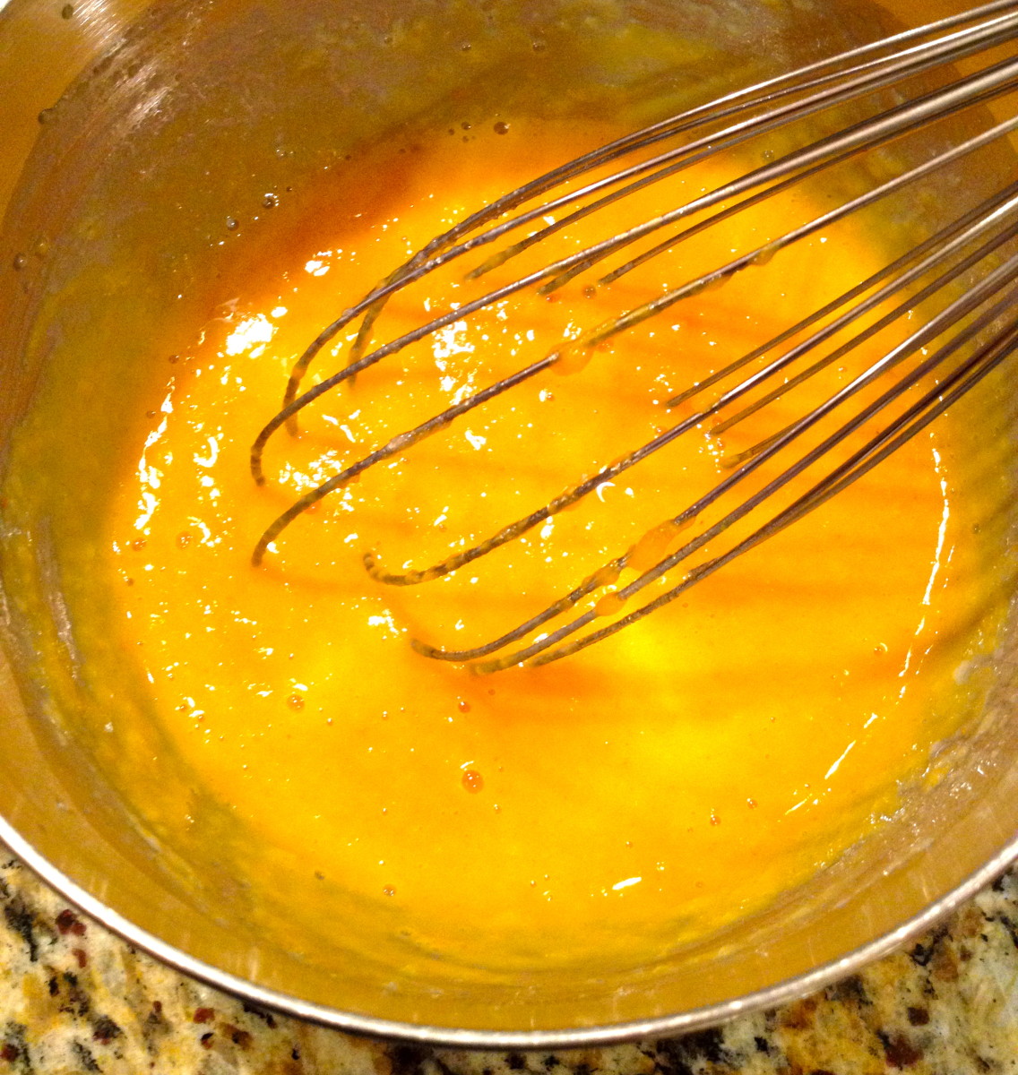 Whisk egg in a smaller bowl and add pumpkin, sugar, applesauce, almond milk, and vanilla. Stir to combine.