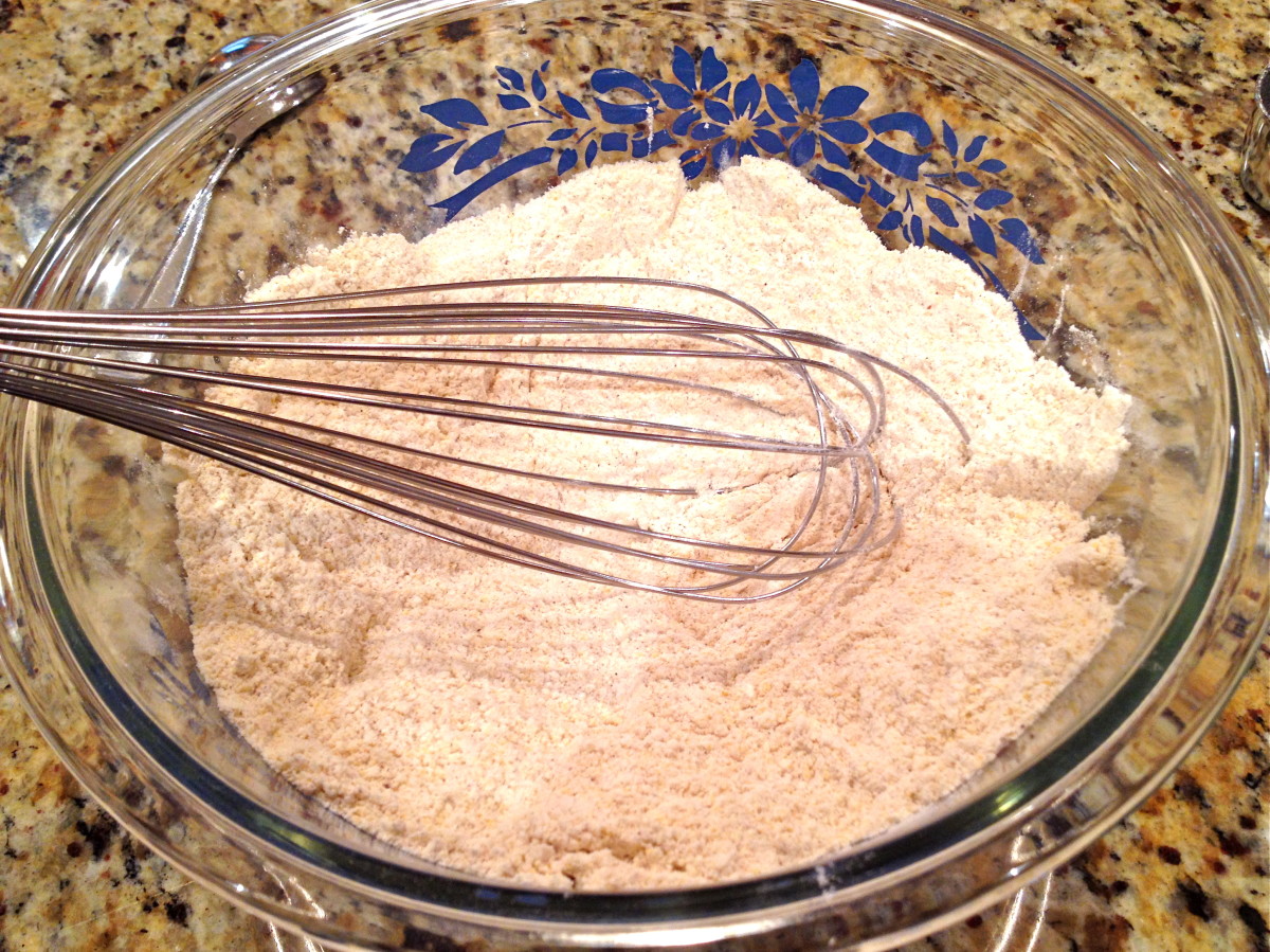 Combine flour, cornmeal, baking soda, baking powder, and spices. Stir to combine making a well in the center.