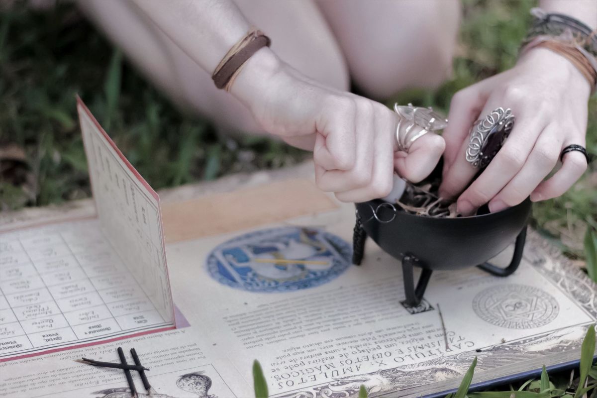 Shown is a person preparing to burn herbs. In all occult arts, any valid process that you can add to a rite will pay off by augmenting positive results.