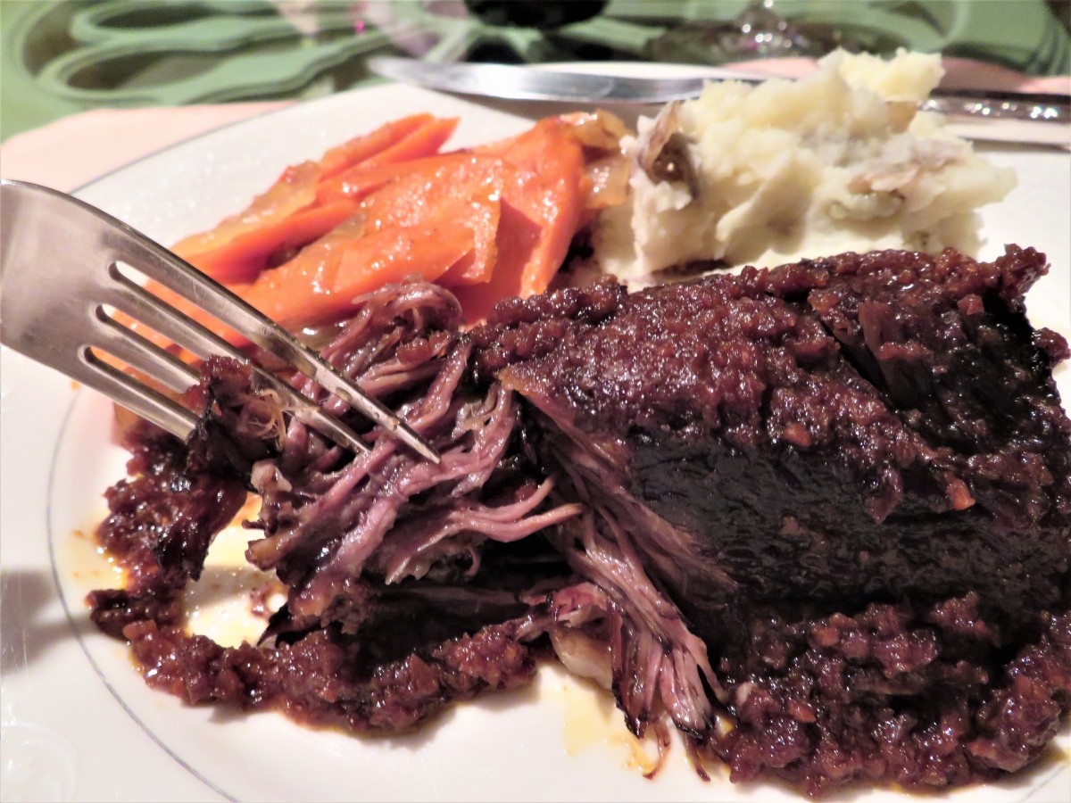 Braised short ribs with caramelized carrots and onions plus rustic skin-on mashed potatoes