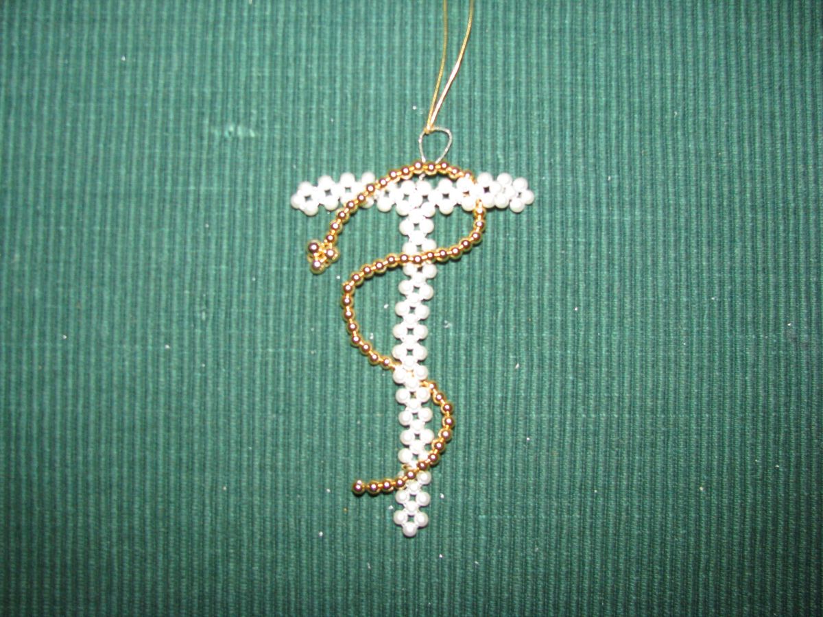 Tau Cross With Snake