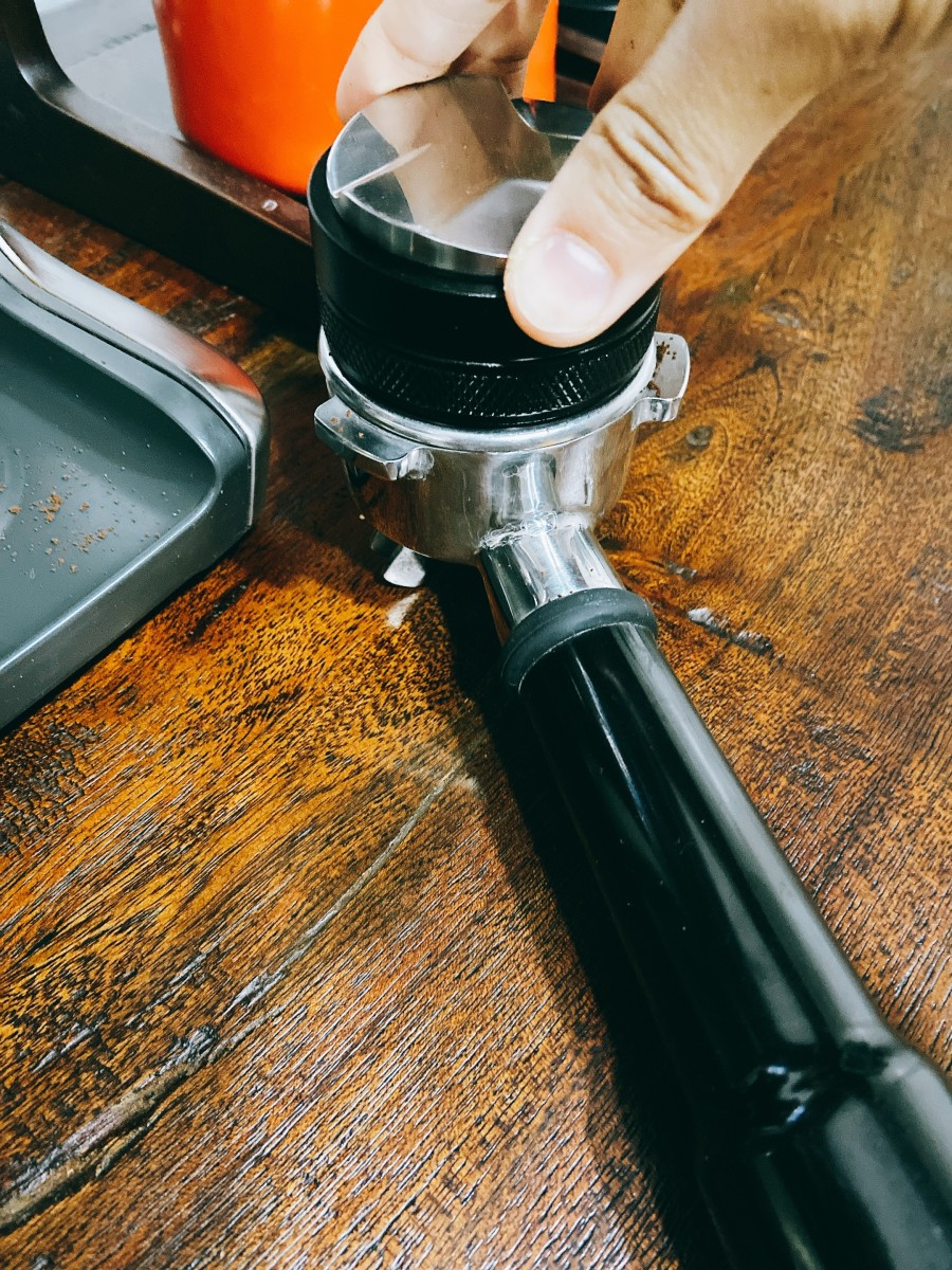 Give it a good tamp; aim for about 30 pounds of pressure.
