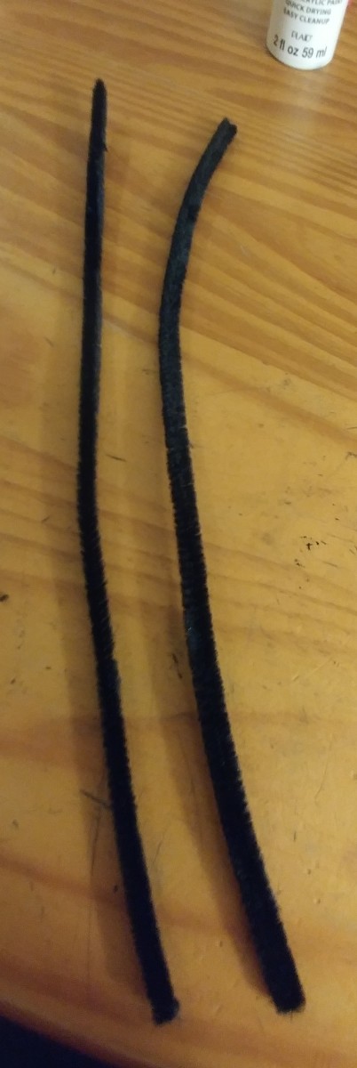 Black fuzzy sticks are perfect for this craft, they are also called pipe cleaners.