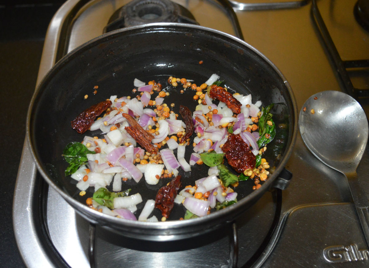 Add chopped onions. Saute until the onions become pinkish.