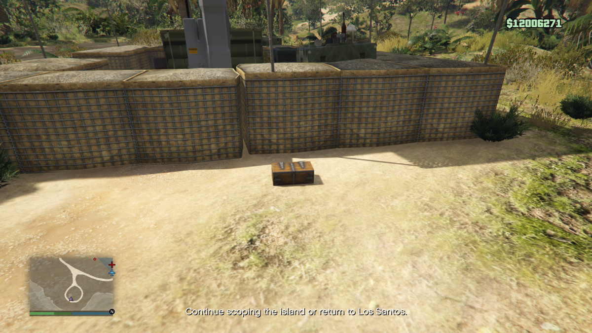 When "Gathering Intel" for the Heist on Cayo Perico look for these wooden treasure chests. There are only two to be grabbed. You will hear a noise, and feel a vibration in your controller, when near one of these chests.