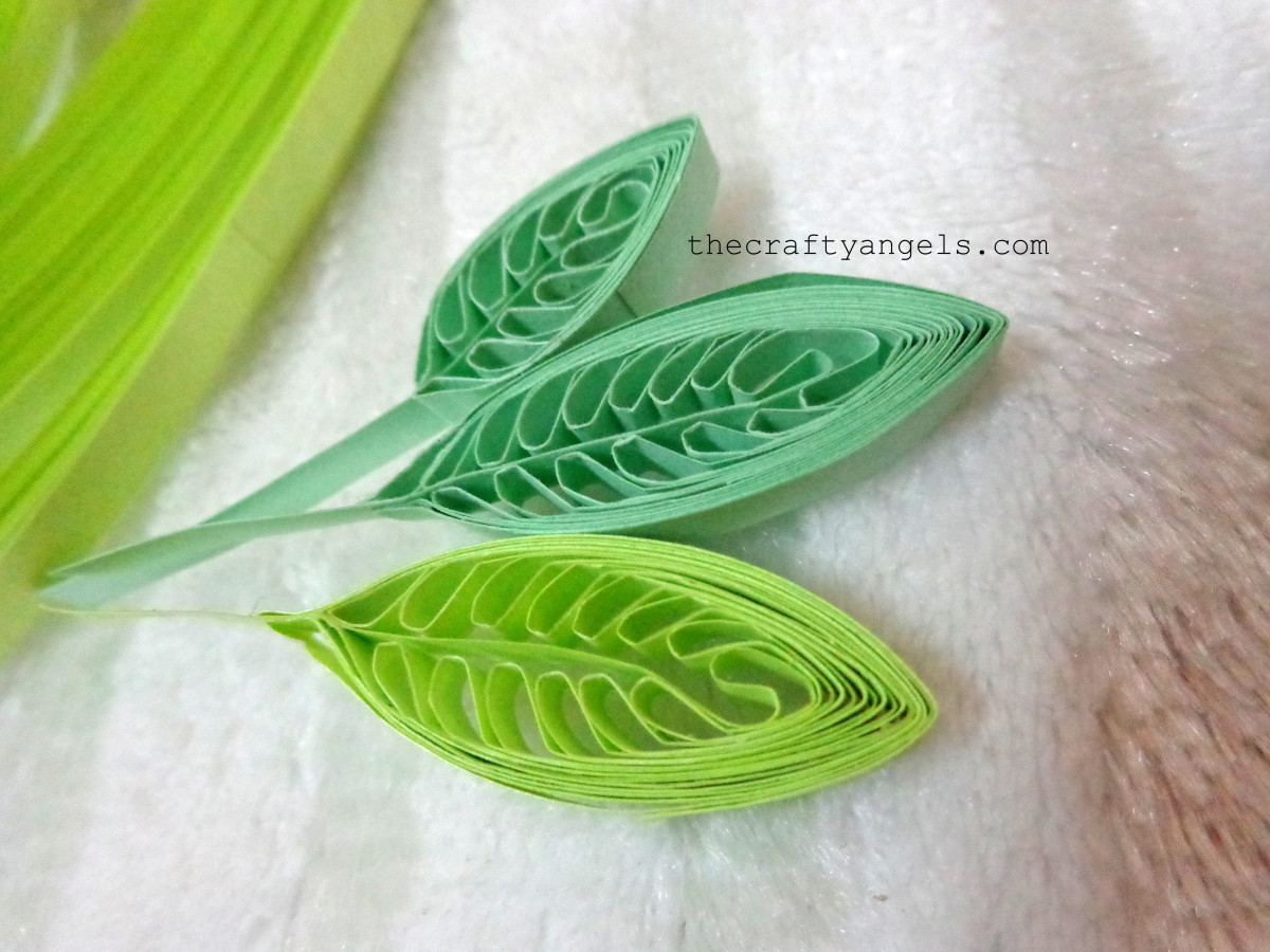 Adding leaves to your quilled flowers makes them pop