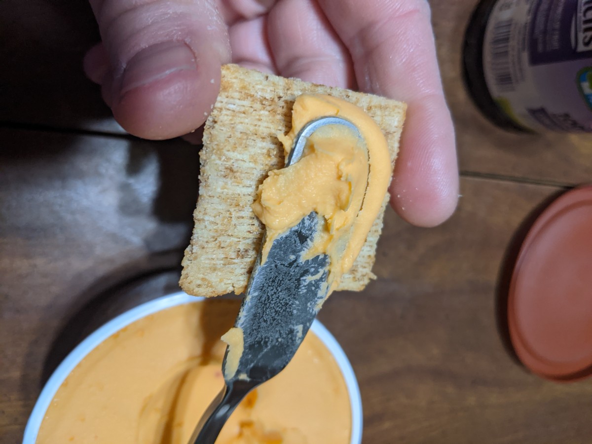 spreadable-cheese-smeared-on-a-cracker