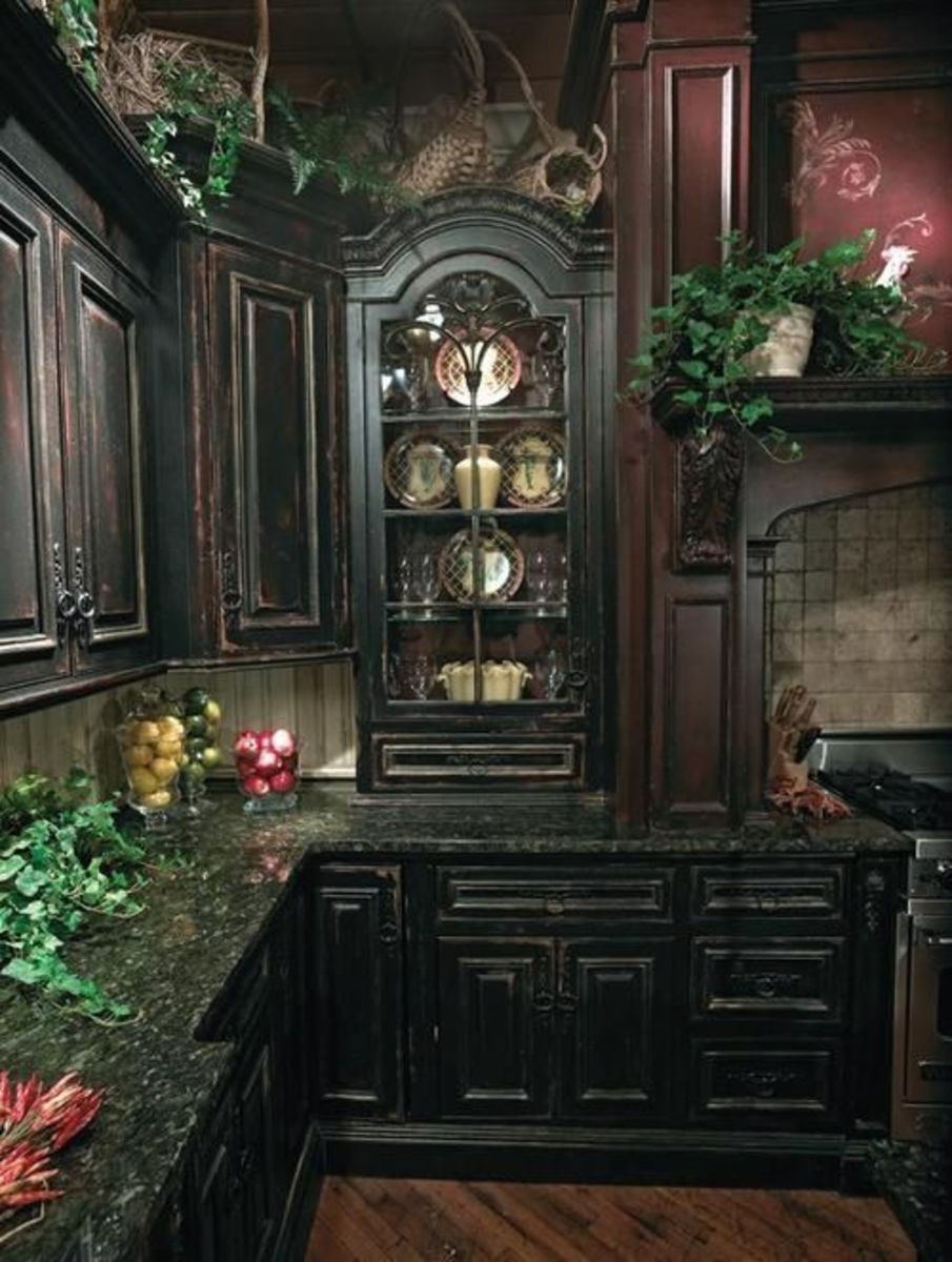 Add some flora into the kitchen. Dark cabinets, glass, and rounded objects fit the bill for yin energy.
