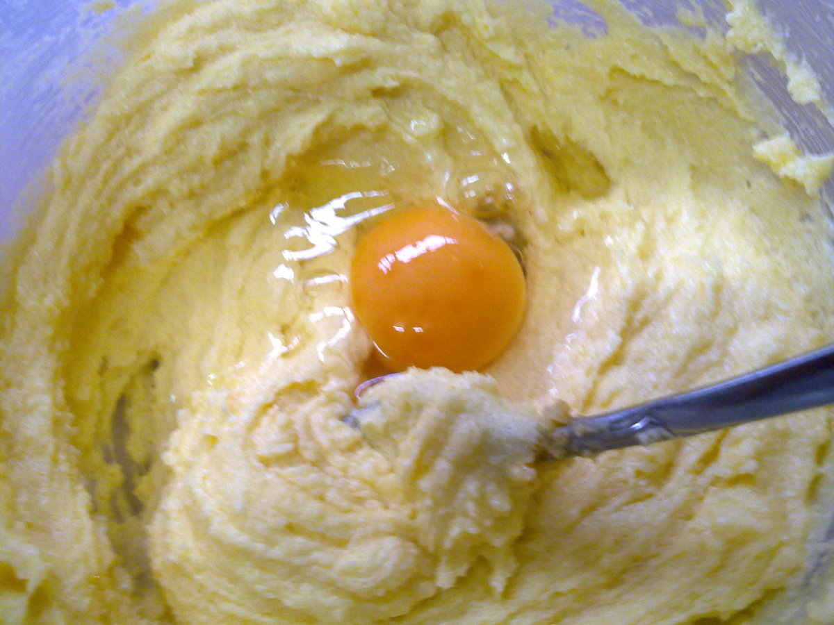 Add in an egg yolk. Mix well.