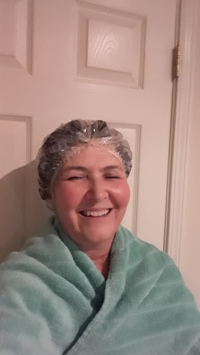 Here I am, looking and feeling ridiculous with coffee and leave-in conditioner piled on my head! This process takes 90 minutes and you need to put a shower cap over your head and keep a towel on the protect clothes and skin from staining.