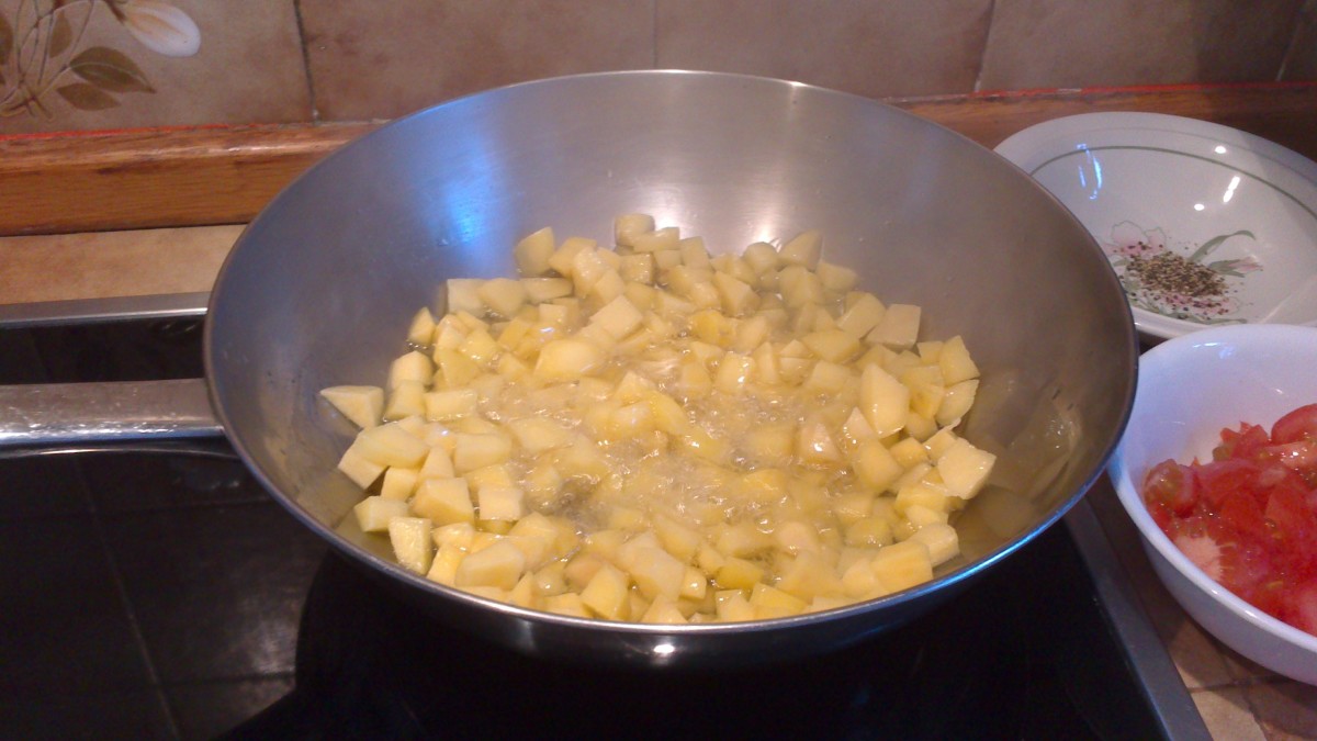 Frying the potatoes first