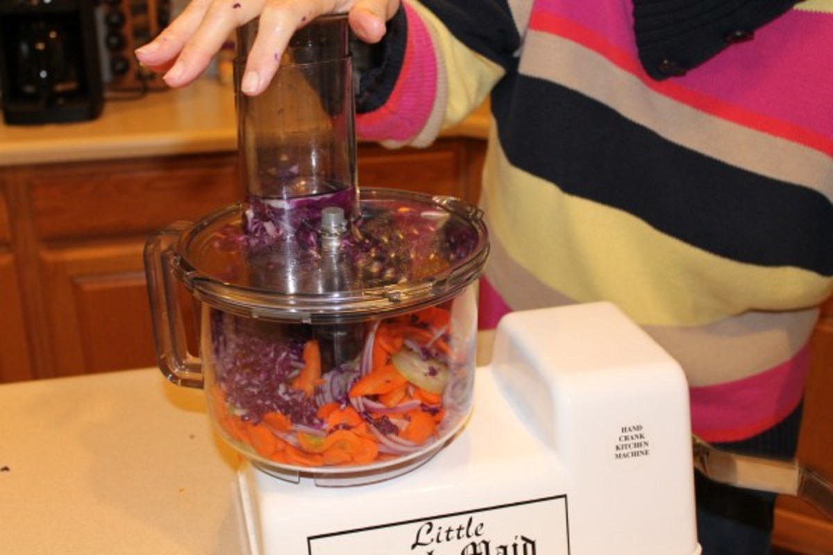 The Little Dutch Maid has an optional food processor to make it a complete hand crank off-grid food processor.